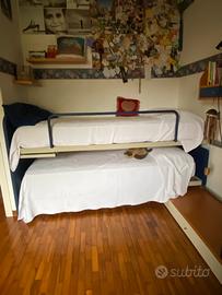 Letti scorrevoli su binari +pedana+mensole