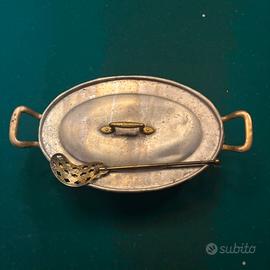 Pentola vintage con schiumarola