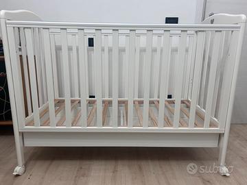 Lettino con sbarre per bambini in legno