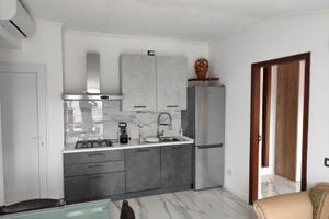 Bilocale interamente arredato