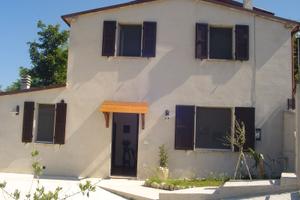 Casa a schiera con giardino per uso transitorio