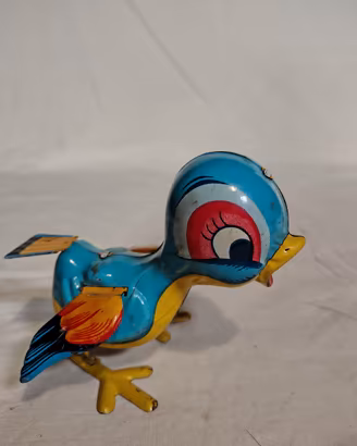 uccellino meccanico a molla anni 50