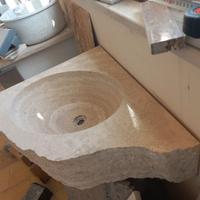 lavabo in travertino in blocco angolare