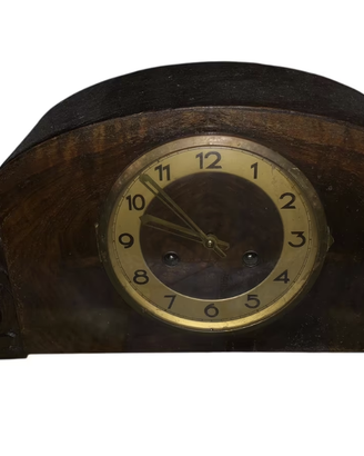 Antico orologio da camino a pendolo e rintocchi