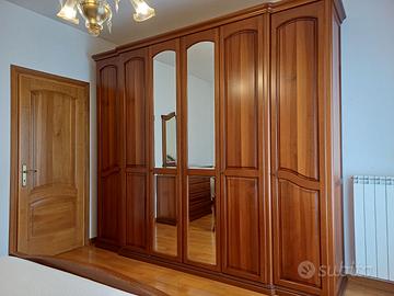 Camera da letto matrimoniale noce