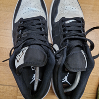 Nike Jordan 4 basse bianco e nere