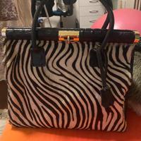 BORSA IN PELLE E CAVALLINO