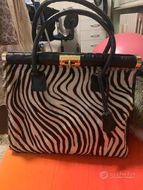 BORSA IN PELLE E CAVALLINO