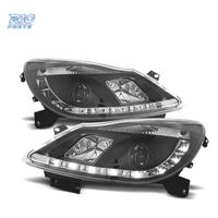 FARI OPEL CORSA D 06-10 LUCE DIURNA FONDO NERO
