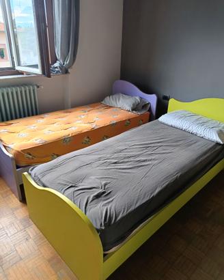 Letti singoli e comodino