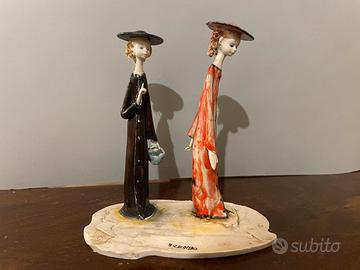 Scultura A. Colombo Lo Scricciolo DAME A PASSEGGIO