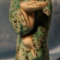 Antica statua cinese saggio con libro