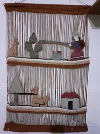 Telo lavorato interamente a mano 