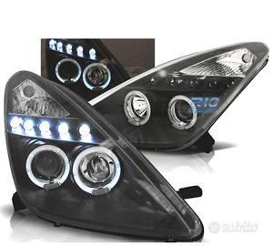 FARI TOYOTA CELICA T23 99-05 LED OCCHI ANGELI NERI