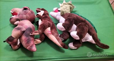 Tre peluche dinosauro