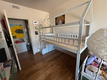 Letto a castello con scivolo