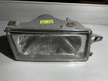 PROIETTORE DX FIAT FIORINO - 7702271- NUOVO ORIGIN
