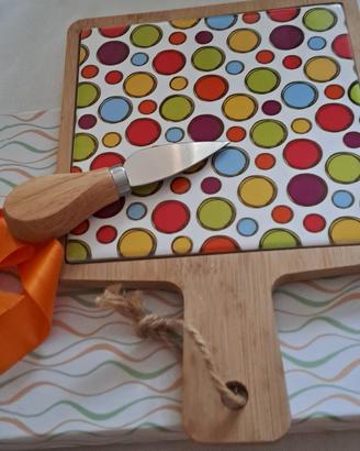 sottopentola con coltello tagliaformaggi