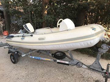 Carrello gommone Ellebi e motore Evinrude 15