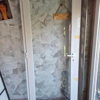 Porta a vetri con serratura