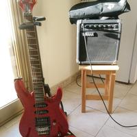 chitarra elettrica metal Washburn tracolla e ampli