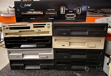 8 lettori floppy 2,5” + 2 DVD + accessori