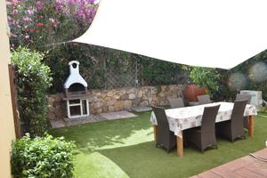 Trilocale centrale con giardino e posto auto