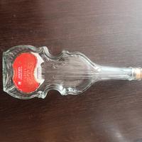 Bottiglia di vetro a forma di violino