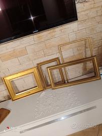 Set quattro cornici in legno 