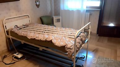 letto  con materasso antidecubito
