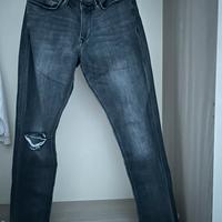 jeans strappati grigi