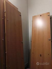 Armadio alto due ante con letto matrimoniale