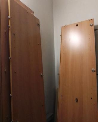 Armadio alto due ante con letto matrimoniale