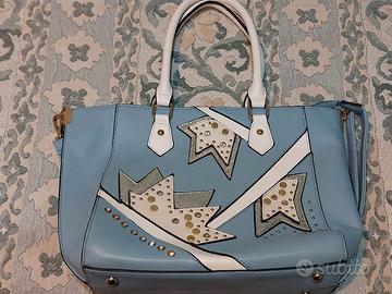 Borsa con Manici Eccentrica e Particolare