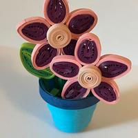 Vasetto di fiori rosa fatto a mano in origami