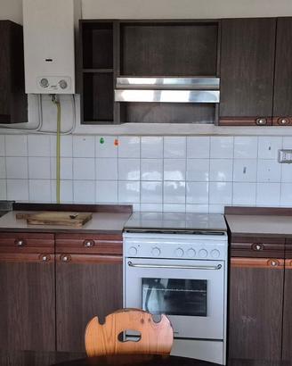 cucina, lavatrice e brandina