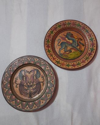piatti decorativi in terracotta vintage
