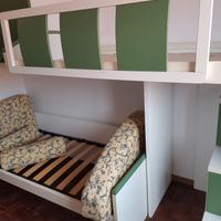 cameretta per ragazzi a tre posti letto