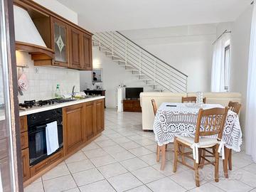 Appartamento con terrazza su due livelli