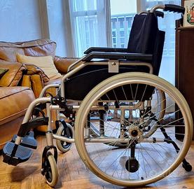 sedia a rotelle pieghevole torino