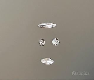 62 Strass, applicazioni, decorazioni abiti, borse