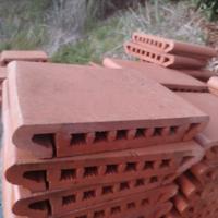Cimase in cotto laterizio