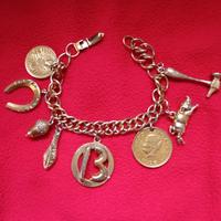bracciale vintage con charms portafortuna