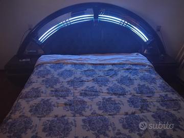 Giroletto con luci led e vera pelle più comodini