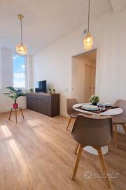 Bilocale nuovo 12° piano con palestra condominiale