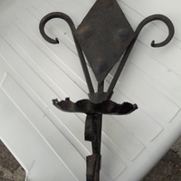 Ferro da appendere lavorato