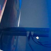 PlayStation 4 con controller e giochi 