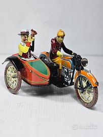 giocattolo vintage in latta serigrafata meccanico