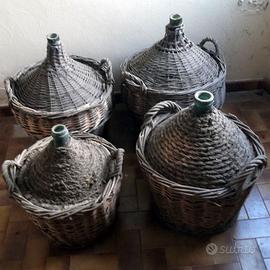 LOTTO DI QUATTRO DAMIGIANE D'EPOCA