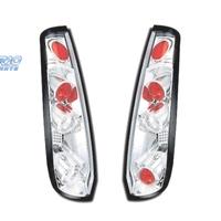 FANALI FORD FIESTA 02-05 FONDO CROMATO